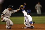 ARLINGTON, TX - MAY 27:  Second baseman Robinson Cano #24 of the New York Yankees makes the out on Elvis Andrus #1 of the Texas Rangers on May 27, 2009 at Rangers Ballpark in Arlington, Texas.  (Photo by Ronald Martinez/Getty Images)