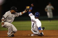 ARLINGTON, TX - MAY 27:  Second baseman Robinson Cano #24 of the New York Yankees makes the out on Elvis Andrus #1 of the Texas Rangers on May 27, 2009 at Rangers Ballpark in Arlington, Texas.  (Photo by Ronald Martinez/Getty Images)