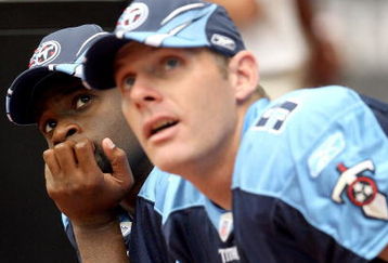 HOUSTON - OCTOBER 21:  Quarterback Vince Young #10 of the Tennessee Titans sits on the bench next to Kerry Collins #5 as they both watch action on the jumbotron during the 1st half of the game against the Houston Texans on October 21, 2007 at Reliant Stadium in Houston Texas.  (Photo by Jamie Squire/Getty Images)