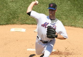 NEW YORK - MAY 31:  John Maine #33 of the New York Mets pitches against  the Florida Marlins during their game on May 31, 2009 at Citi Field in the Flushing neighborhood of the Queens borough of New York City.  (Photo by Al Bello/Getty Images)