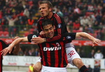 MILAN, ITALY - APRIL 26:  David Beckham of Milan jumps on the back of Kaka to celebrate the first goal during the Serie A match between AC Milan and US Citta di Palermo at the San Siro Stadium on April 26, 2009 in Milan,Italy.  (Photo by Michael Steele/Getty Images)