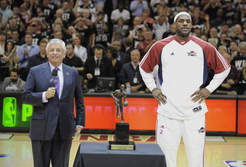 CLEVELAND - MAY 5:  David Stern presents LeBron James #23 of the Cleveland Cavaliers the 2008-2009 MVP Trophy prior to the start of Game One of the Eastern Conference Semifinals against the Atlanta Hawks during the 2009 NBA Playoffs at Quicken Loans Arena on May 5, 2009 in Cleveland, Ohio. The Cavaliers won 99-72. NOTE TO USER: User expressly acknowledges and agrees that, by downloading and or using this photograph, User is consenting to the terms and conditions of the Getty Images License Agreement. 