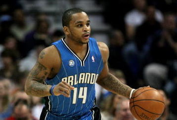 DENVER - JANUARY 17:  Jameer Nelson #14 of the Orlando Magic dribbles the ball upcourt against the Denver Nuggets during NBA action at the Pepsi Center on January 17, 2009 in Denver, Colorado. The Magic defeated the Nuggets 106-88. NOTE TO USER: User expressly acknowledges and agrees that, by downloading and or using this Photograph, user is consenting to the terms and conditions of the Getty Images License Agreement.  (Photo by Doug Pensinger/Getty Images)
