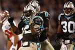 CHARLOTTE, NC - DECEMBER 08:  Jon Beason #52 of the Carolina Panthers reacts to making a stop on defense against the Tampa Bay Buccaneers at Bank of America Stadium on December 8, 2008 in Charlotte, North Carolina  (Photo by Streeter Lecka/Getty Images)