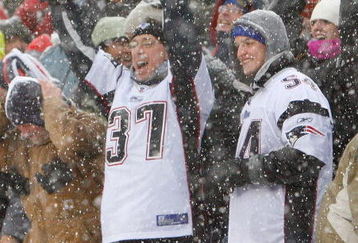 FOXBORO, MA - DECEMBER 21: Fans of the New England Patriots react after touchdown against the Arizona Cardinals at Gillette Stadium on December 21, 2008 in Foxboro, Massachusetts. The Patriots won 47-7. (Photo by Jim Rogash/Getty Images)