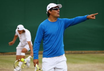LONDON - JULY 05:  Rafael Nadal of Spain's coach and uncle, Toni Nadal conducts a practice session on day twelve of the Wimbledon Lawn Tennis Championships at the All England Lawn Tennis and Croquet Club on July 5, 2008 in London, England.  (Photo by Clive Brunskill/Getty Images)