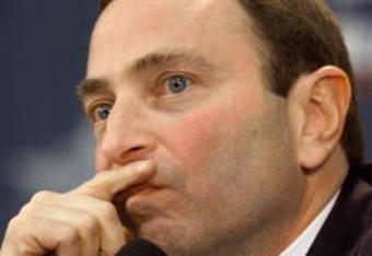 3 Feb 2001:  Commissioner Gary Bettman ponders a  question from the media during a press conference before the NHL All-Star Game at the Pepsi Center in Denver, Colorado.   DIGITAL IMAGE. Mandatory Credit: Brian Bahr/ALLSPORT