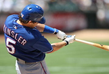 OAKLAND, CA - MAY 07:  Ian Kinsler #5 of the Texas Rangers bats against the Oakland Athletics during a Major League Baseball game on May 7, 2009 at the Oakland Coliseum in Oakland, California.  (Photo by Jed Jacobsohn/Getty Images)