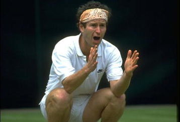 30 JUN 1991:  JOHN MCENROE OF THE UNITED STATES ARGUES WITH THE UMPIRE OVER A CALL OF OUT DURING THE 1991 WIMBLEDON CHAMPIONSHIPS.