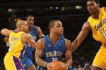 LOS ANGELES - JANUARY 16:  Jameer Nelson #14 of the Orlando Magic makes a move to the basket against Andrew Bynum #17 of the Los Angeles Lakers during their NBA game on January 16, 2009 at Staples Center in Los Angeles, California. The Magic won 109-103.   NOTE TO USER: User expressly acknowledges and agrees that, by downloading and/or using this Photograph, user is consenting to the terms and conditions of the Getty Images License Agreement. (Photo by Stephen Dunn/Getty Images)