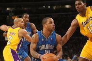 LOS ANGELES - JANUARY 16:  Jameer Nelson #14 of the Orlando Magic makes a move to the basket against Andrew Bynum #17 of the Los Angeles Lakers during their NBA game on January 16, 2009 at Staples Center in Los Angeles, California. The Magic won 109-103.   NOTE TO USER: User expressly acknowledges and agrees that, by downloading and/or using this Photograph, user is consenting to the terms and conditions of the Getty Images License Agreement. (Photo by Stephen Dunn/Getty Images)