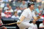 NEW YORK - MAY 24:  Mark Teixeira #25 of the New York Yankees at bat against the Philadelphia Phillies on May 24, 2009 at Yankee Stadium in the Bronx borough of New York City.  (Photo by Nick Laham/Getty Images)