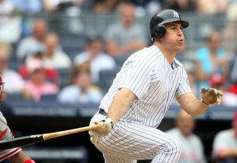 NEW YORK - MAY 24:  Mark Teixeira #25 of the New York Yankees at bat against the Philadelphia Phillies on May 24, 2009 at Yankee Stadium in the Bronx borough of New York City.  (Photo by Nick Laham/Getty Images)
