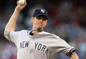ARLINGTON, TX - MAY 27:  Pitcher A.J. Burnett #34 of the New York Yankees throws against the Texas Rangers in the first inning on May 27, 2009 at Rangers Ballpark in Arlington, Texas.  (Photo by Ronald Martinez/Getty Images)
