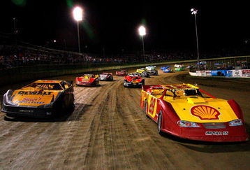 ROSSBURG, OH - JUNE 04: Matt Kenseth, driver of the #17 DeWalt Ford and Kevin Harvick, driver of the #29 Shell Chevrolet lead the field during the pace laps prior to the start of the Old Spice Prelude to the Dream at Eldora Speedway on June 4, 2008 in Rossburg, Ohio.  (Photo by Rusty Jarrett/Getty Images for Eldora Speedway)