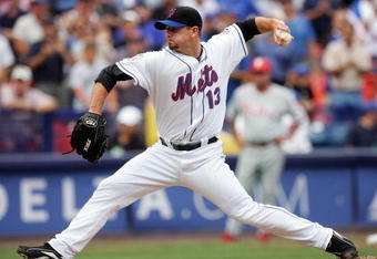 NEW YORK - JULY 24:  Billy Wagner #13 of the New York Mets pitches against the Philadelphia Phillies on July 24, 2008 at Shea Stadium in the Flushing neighborhood of the Queens borough of New York City. The Mets defeated the Phillies 3-1.  (Photo by Jim McIsaac/Getty Images)
