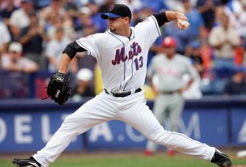 NEW YORK - JULY 24:  Billy Wagner #13 of the New York Mets pitches against the Philadelphia Phillies on July 24, 2008 at Shea Stadium in the Flushing neighborhood of the Queens borough of New York City. The Mets defeated the Phillies 3-1.  (Photo by Jim McIsaac/Getty Images)
