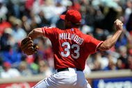 ARLINGTON, TX - APRIL 6:  Pitcher Kevin Millwood #33 of the Texas Rangers throws against the Cleveland Indians during the home opener at Rangers Ballpark April 6, 2009 in Arlington, Texas.  (Photo by Ronald Martinez/Getty Images)