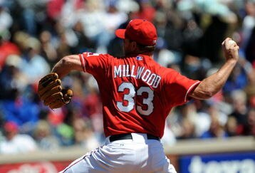 ARLINGTON, TX - APRIL 6:  Pitcher Kevin Millwood #33 of the Texas Rangers throws against the Cleveland Indians during the home opener at Rangers Ballpark April 6, 2009 in Arlington, Texas.  (Photo by Ronald Martinez/Getty Images)