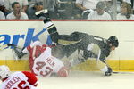PITTSBURGH - JUNE 02:  Darren Helm #43 of the Detroit Red Wings trips up Jordan Staal #11 of the Pittsburgh Penguins during Game Three of the 2009 NHL Stanley Cup Finals on June 2, 2009 at Mellon Arena in Pittsburgh, Pennsylvania.  (Photo by Jim McIsaac/Getty Images)