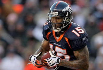 DENVER - DECEMBER 21:  Wide receiver Brandon Marshall #15 of the Denver Broncos makes a 24 yard reception before fumbling the ball to the Buffalo Bills in the third quarter during NFL action at Invesco Field at Mile High on December 21, 2008 in Denver, Colorado. The Bills defeated the Broncos 30-23.  (Photo by Doug Pensinger/Getty Images)