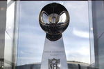 GLENDALE, AZ - JANUARY 26:  The Vince Lombardi Trophy was brought in by NFL Security and put on display.  Football fans take in all the activities during the NFL Experience on January 26, 2008 at University of Phoenix Stadium in Glendale, Arizona. (Photo By Domenic Centofanti/Getty Images)