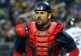 NEW YORK - APRIL 03:  Jason Varitek #33 of the Boston Red Sox runs off the field against the New York Mets on April 3, 2009 at Citi Field in the Flushing neighborhood of the Queens borough of New York City. The game marks the first time the Mets play in their new ballpark. The Mets won the game 4-3.  (Photo by Jim McIsaac/Getty Images)
