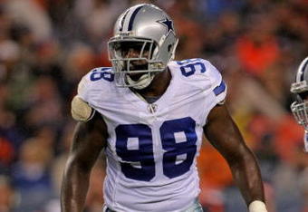 DENVER - AUGUST 16:  Linebacker Greg Ellis #98 of the Dallas Cowboys prepares for action against the Denver Broncos during preseason NFL action at Invesco Field at Mile High on August 16, 2008 in Denver, Colorado. The Broncos defeated the Cowboys 23-13.  (Photo by Doug Pensinger/Getty Images)