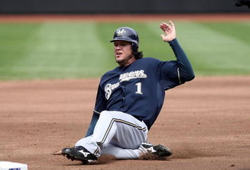 NEW YORK - APRIL 19: Corey Hart #1 of the Milwaukee Brewers slides into third against the New York Mets at Citi Field on April 19, 2009 in the Flushing neighborhood of the Queens borough of New York City.  (Photo by Nick Laham/Getty Images)