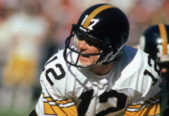ATLANTA - NOVEMBER 1:  Quarterback Terry Bradshaw #12 of the Pittsburgh Steelers calls the play during the game against the Atlanta Falcons at Fulton County Stadium on November 1, 1981 in Atlanta, Georgia. The Steelers defeated the Falcons 34-20.  (Photo by: Scott Cunningham/Getty Images).