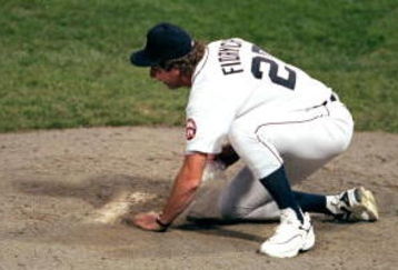 27 Sep 1999: Mark Fidrych of the Detroit Tigers scoops up dirt after the last game played at the Tiger Stadium against the Kansas City Royals in Detroit, Michigan. The Tigers defeated the Royals 8-2. Mandatory Credit: Ezra O. Shaw  /Allsport
