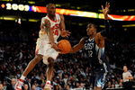 PHOENIX - FEBRUARY 15:  Kobe Bryant #24 of the Western Conference jumps up to pass around Dwight Howard #12 of the Eastern Conference during the 58th NBA All-Star Game, part of 2009 NBA All-Star Weekend at US Airways Center on February 15, 2009 in Phoenix, Arizona.  NOTE TO USER: User expressly acknowledges and agrees that, by downloading and or using this photograph, User is consenting to the terms and conditions of the Getty Images License Agreement.  (Photo by Ronald Martinez/Getty Images)