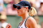 PARIS - JUNE 03:  Samantha Stosur of Australia celebrates a point during the Women's Singles Quarter Final match against Sorana Cirstea of Romania on day eleven of the French Open at Roland Garros on June 3, 2009 in Paris, France.  (Photo by Matthew Stockman/Getty Images)