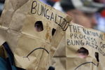 CINCINNATI - NOVEMBER 30:  Two football spectators wear bags over their heads during the NFL game between the Baltimore Ravens and the Cincinnati Bengals on November 30, 2008 at Paul Brown Stadium in Cincinnati, Ohio. The Ravens defeated the Bengals 34-3.(Photo by Andy Lyons/Getty Images)