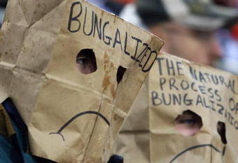 CINCINNATI - NOVEMBER 30:  Two football spectators wear bags over their heads during the NFL game between the Baltimore Ravens and the Cincinnati Bengals on November 30, 2008 at Paul Brown Stadium in Cincinnati, Ohio. The Ravens defeated the Bengals 34-3.(Photo by Andy Lyons/Getty Images)
