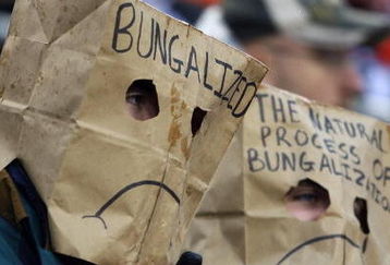 CINCINNATI - NOVEMBER 30:  Two football spectators wear bags over their heads during the NFL game between the Baltimore Ravens and the Cincinnati Bengals on November 30, 2008 at Paul Brown Stadium in Cincinnati, Ohio. The Ravens defeated the Bengals 34-3.(Photo by Andy Lyons/Getty Images)