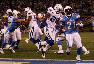 SAN DIEGO - JANUARY 03:  LaDainian Tomlinson #21 of the San Diego Chargers scores a touchdown against the Indianapolis Colts in the AFC Wild Card Game on January 3, 2009 at Qualcomm Stadium in San Diego, California.  (Photo by Stephen Dunn/Getty Images)