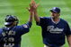 DENVER - MAY 31:  Relief pitcher Heath Bell #21 of the San Diego Padres celebrates with catcher Henry Blanco #28 after closing against the Colorado Rockies during MLB action at Coors Field on May 31, 2009 in Denver, Colorado. Bell earned the save as the Padres defeated the Rockies 5-2.  (Photo by Doug Pensinger/Getty Images)