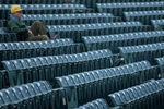FORT COLLINS, CO - NOVEMBER 01:  A lone fan takes his seat as the Brigham Young Cougars and the Colorado State Rams take the field to warm up prior to the game at Sonny Lubick Field at Hughes Stadium on November 1, 2008 in Fort Collins, Colorado. BYU defeated CSU 45-42.  (Photo by Doug Pensinger/Getty Images)