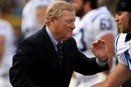 GREEN BAY, WI - OCTOBER 19:  Indianapolis Colts president Bill Polian greets safety Jamie Silva #40 during warmups for the game with the Green Bay Packers on October 19, 2008 at Lambeau Field in Green Bay Wisconsin. The Packers won 34-14.  (Photo by Stephen Dunn/Getty Images)
