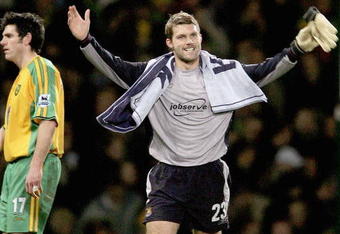 LONDON - JANUARY 8:  James Walker, the West Ham goalkeeper, celebrates at the end of  the FA Cup Third Round match between West Ham United and Norwich City at Upton Park on January 8, 2005 in London, England.  (Photo by Phil Cole/Getty Images)