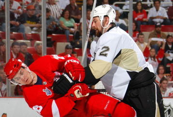 DETROIT - MAY 26:  Hal Gill #2 of the Pittsburgh Penguins collides into Jiri Hudler #26 of the Detroit Red Wings during game two of the 2008 NHL Stanley Cup Finals at Joe Louis Arena on May 26, 2008 in Detroit, Michigan.  (Photo by Dave Sandford/Getty Images)