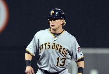 NEW YORK - MAY 08:  Nate McLouth #13 of the Pittsburgh Pirates leads off second base against the New York Mets on May 8, 2009 at Citi Field in the Flushing neighborhood of the Queens borough of New York City. The Mets defeated the Pirates 7-3.  (Photo by Jim McIsaac/Getty Images)