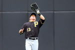 NEW YORK - MAY 09:  Nate McLouth #13 of the Pittsburgh Pirates plays the field against the New York Mets on May 9, 2009 at Citi Field in the Flushing neighborhood of the Queens borough of New York City. The Mets defeated the Pirates 10-1.  (Photo by Jim McIsaac/Getty Images)