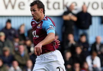 LONDON - NOVEMBER 25:  Lucas Neill of West Ham in action during the Barclays Premier League match between West Ham United and Tottenham Hotspur at Upton Park on November 25, 2007 in London, England.  (Photo by Hamish Blair/Getty Images)