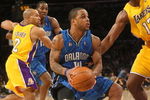 LOS ANGELES - JANUARY 16:  Jameer Nelson #14 of the Orlando Magic makes a move to the basket against Andrew Bynum #17 of the Los Angeles Lakers during their NBA game on January 16, 2009 at Staples Center in Los Angeles, California. The Magic won 109-103.   NOTE TO USER: User expressly acknowledges and agrees that, by downloading and/or using this Photograph, user is consenting to the terms and conditions of the Getty Images License Agreement. (Photo by Stephen Dunn/Getty Images)