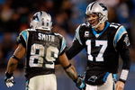 CHARLOTTE, NC - DECEMBER 14:  Teammates Jake Delhomme #17 and Steve Smith #89 of the Carolina Panthers celebrate during their game against the Denver Broncos at Bank of America Stadium on December 14, 2008 in Charlotte, North Carolina  (Photo by Streeter Lecka/Getty Images)