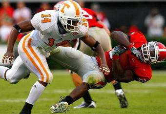 ATHENS, GA - OCTOBER 11:  Eric Berry #14 of the Tennessee Volunteers tackles Knowshon Moreno #24 of the Georgia Bulldogs during the game at Sanford Stadium on October 11, 2008 in Athens, Georgia.  (Photo by Kevin C. Cox/Getty Images)