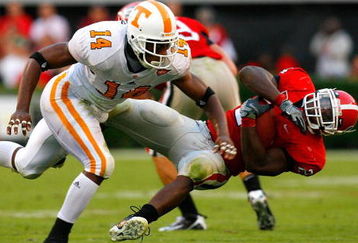 ATHENS, GA - OCTOBER 11:  Eric Berry #14 of the Tennessee Volunteers tackles Knowshon Moreno #24 of the Georgia Bulldogs during the game at Sanford Stadium on October 11, 2008 in Athens, Georgia.  (Photo by Kevin C. Cox/Getty Images)