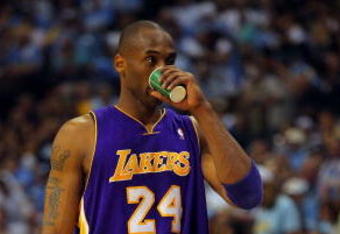 DENVER - MAY 29:  Kobe Bryant #24 of the Los Angeles Lakers takes a drink against the Denver Nuggets in Game Six of the Western Conference Finals during the 2009 NBA Playoffs at Pepsi Center on May 29, 2009 in Denver, Colorado. NOTE TO USER: User expressly acknowledges and agrees that, by downloading and or using this photograph, User is consenting to the terms and conditions of the Getty Images License Agreement.  (Photo by Doug Pensinger/Getty Images)